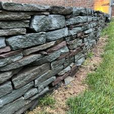 Algae-Free-Makeover-Renewing-Retaining-Walls-in-Doylestown-PA 1